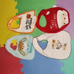 1st holiday bibs,  quantity 4, like new